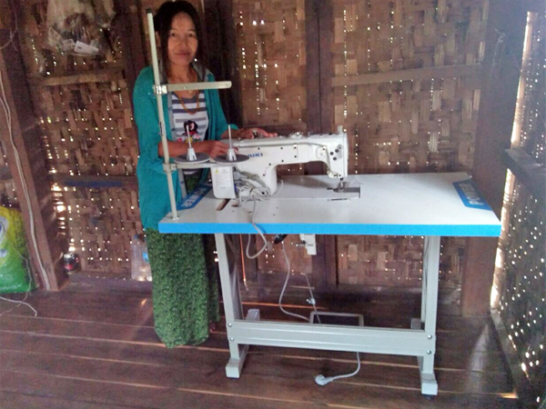 Lady Posing Near Sewing Machine